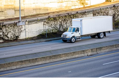 white-six-wheel-truck-on-open-road